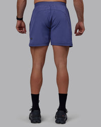 Man wearing Challenger 6" Performance Shorts - Future Dusk