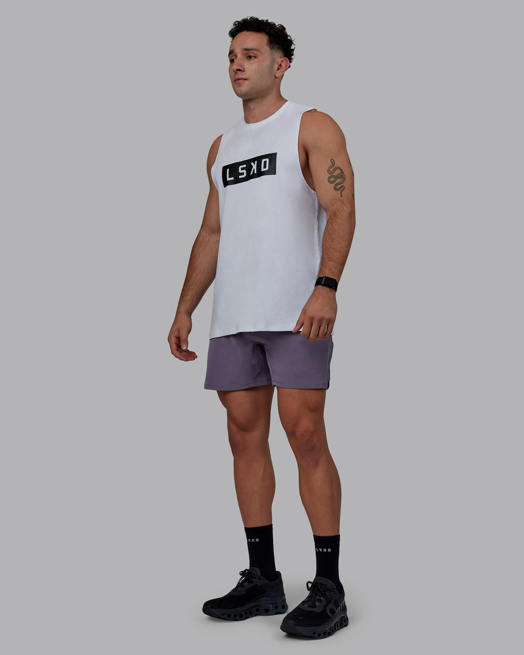 Man wearing Challenger 6&quot; Performance Shorts - Purple Sage