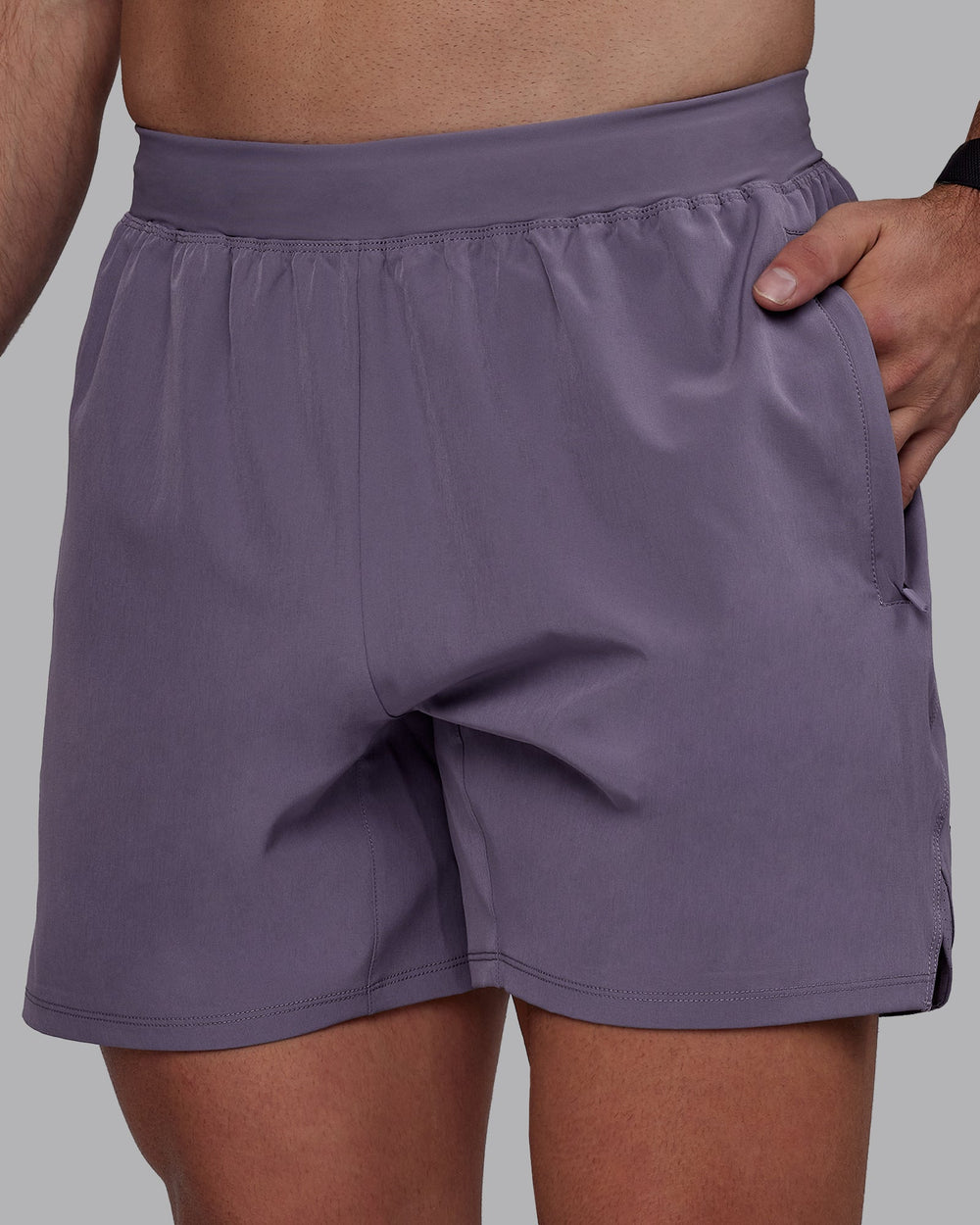 Man wearing Challenger 6" Performance Shorts - Purple Sage