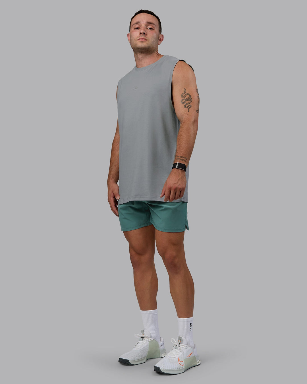 Man wearing Challenger 6&quot; Performance Shorts - Sagebrush