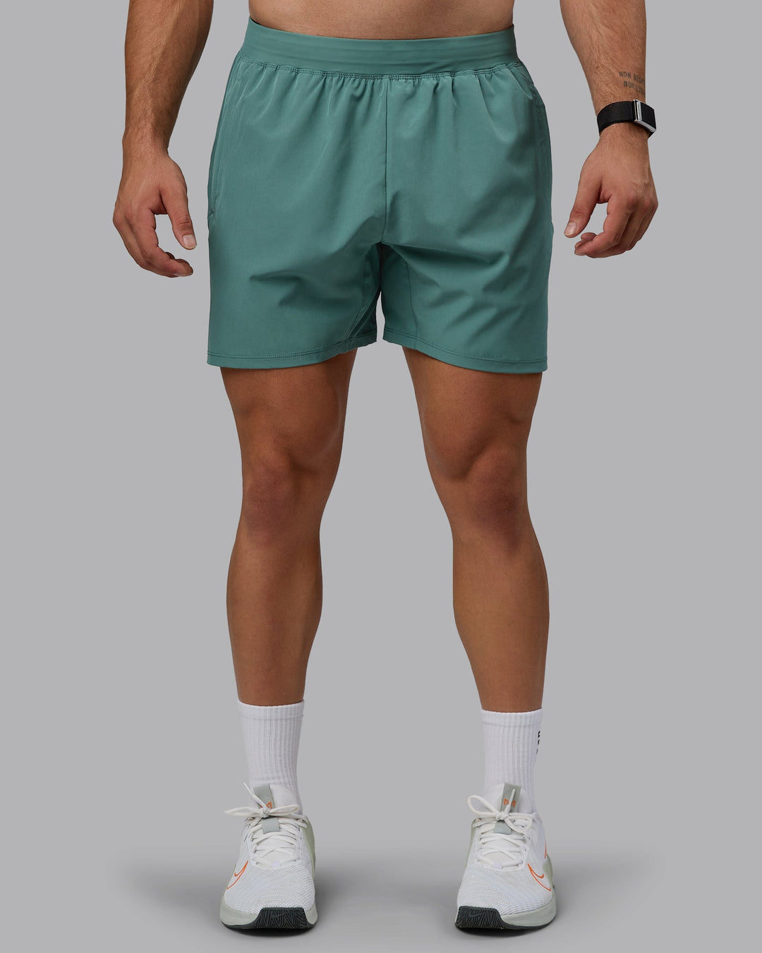 Man wearing Challenger 6&quot; Performance Shorts - Sagebrush