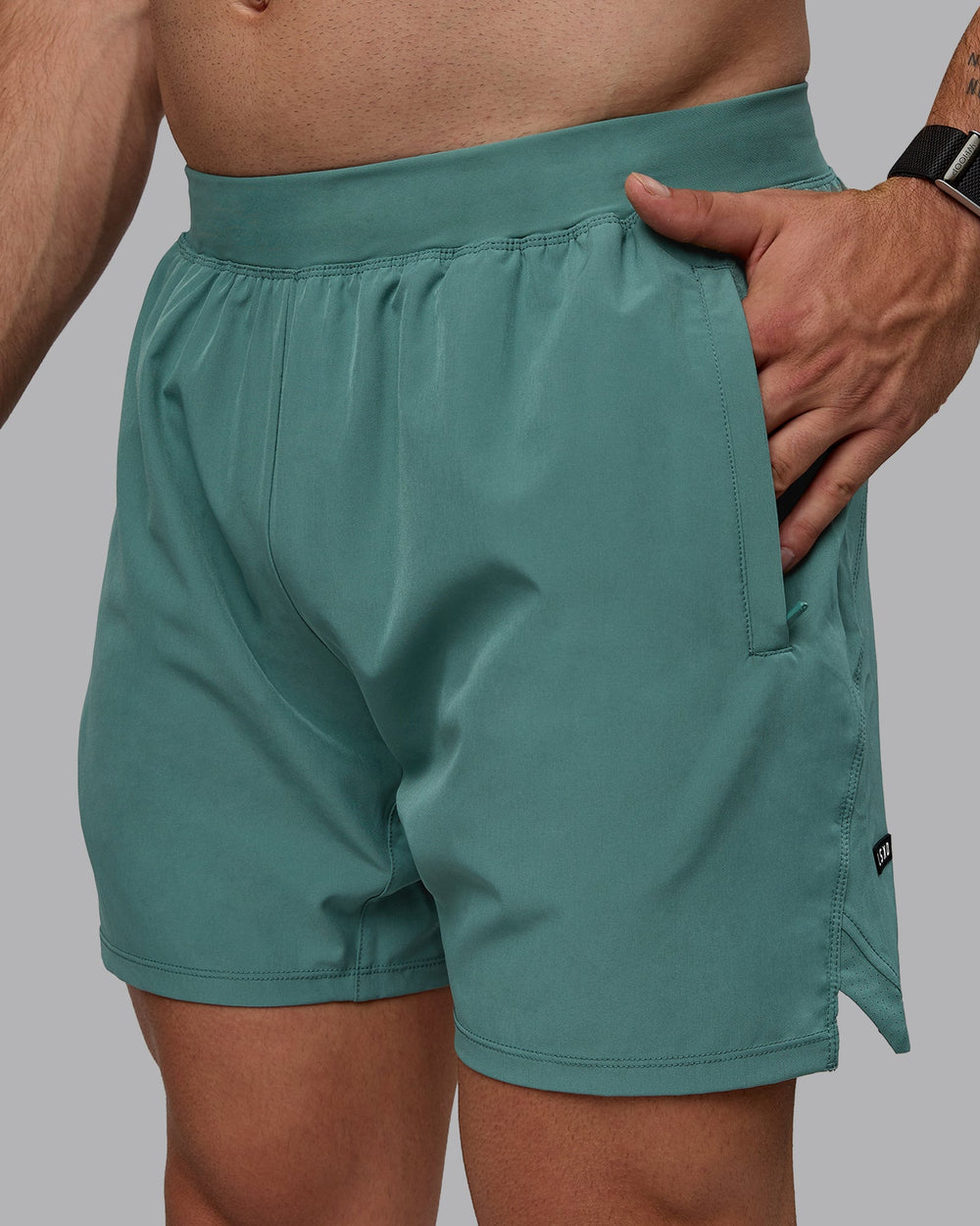 Man wearing Challenger 6" Performance Shorts - Sagebrush