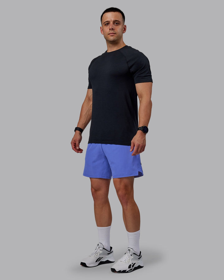 Man wearing Challenger 6&quot; Performance Shorts - Baja Blue
