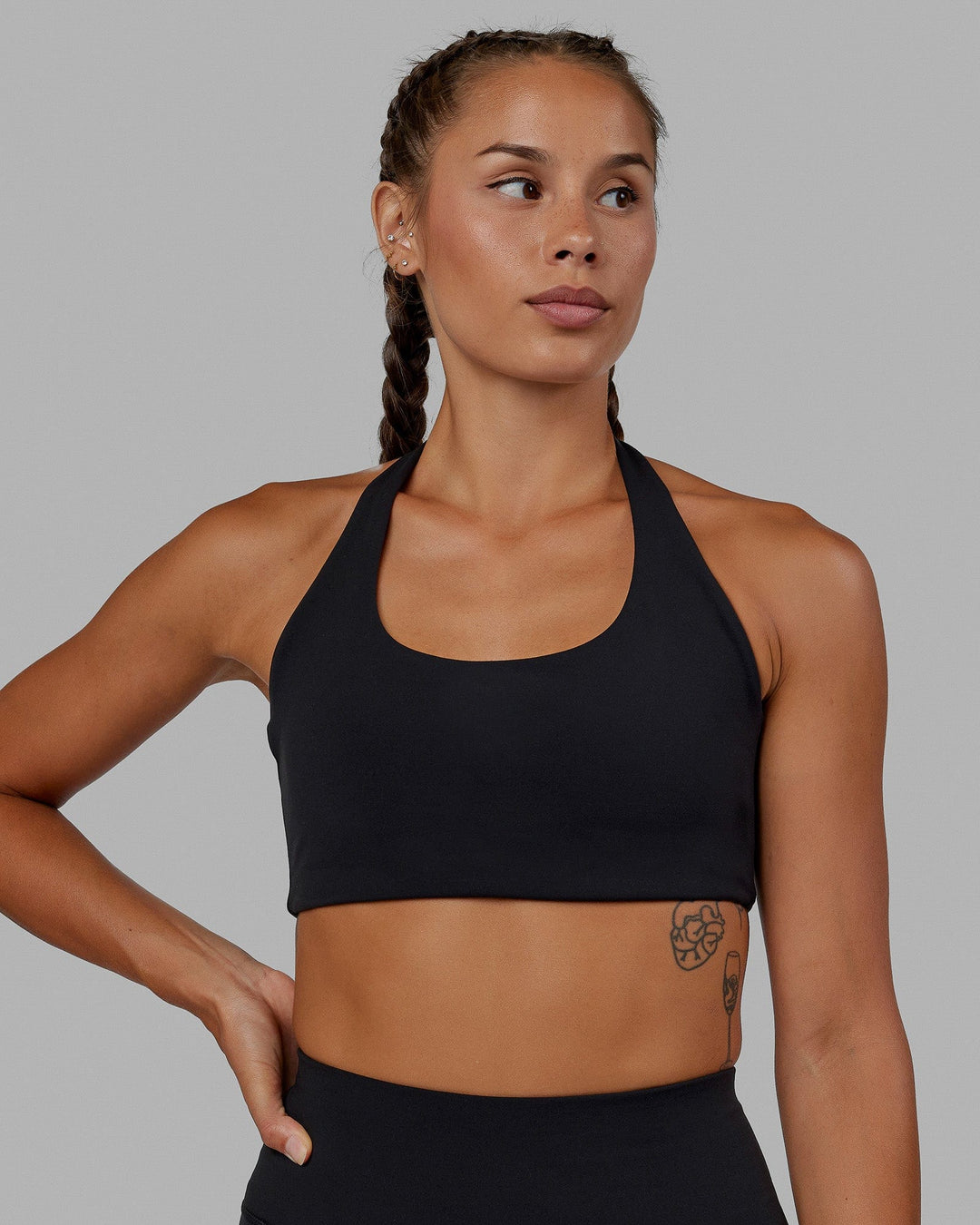 Woman wearing Challenger Sports Bra - Black