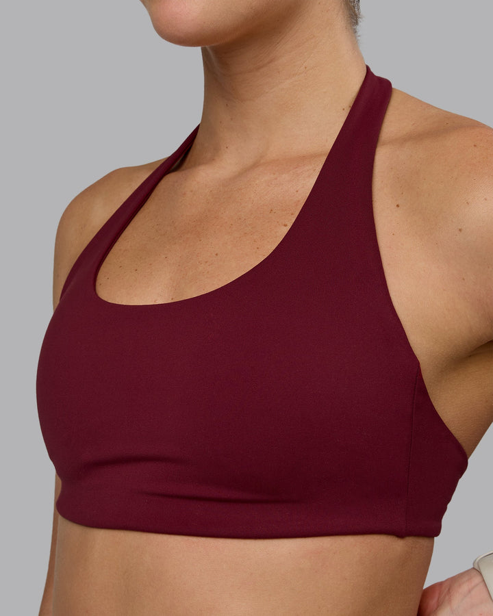 Woman wearing Challenger Sports Bra - Cordovan
