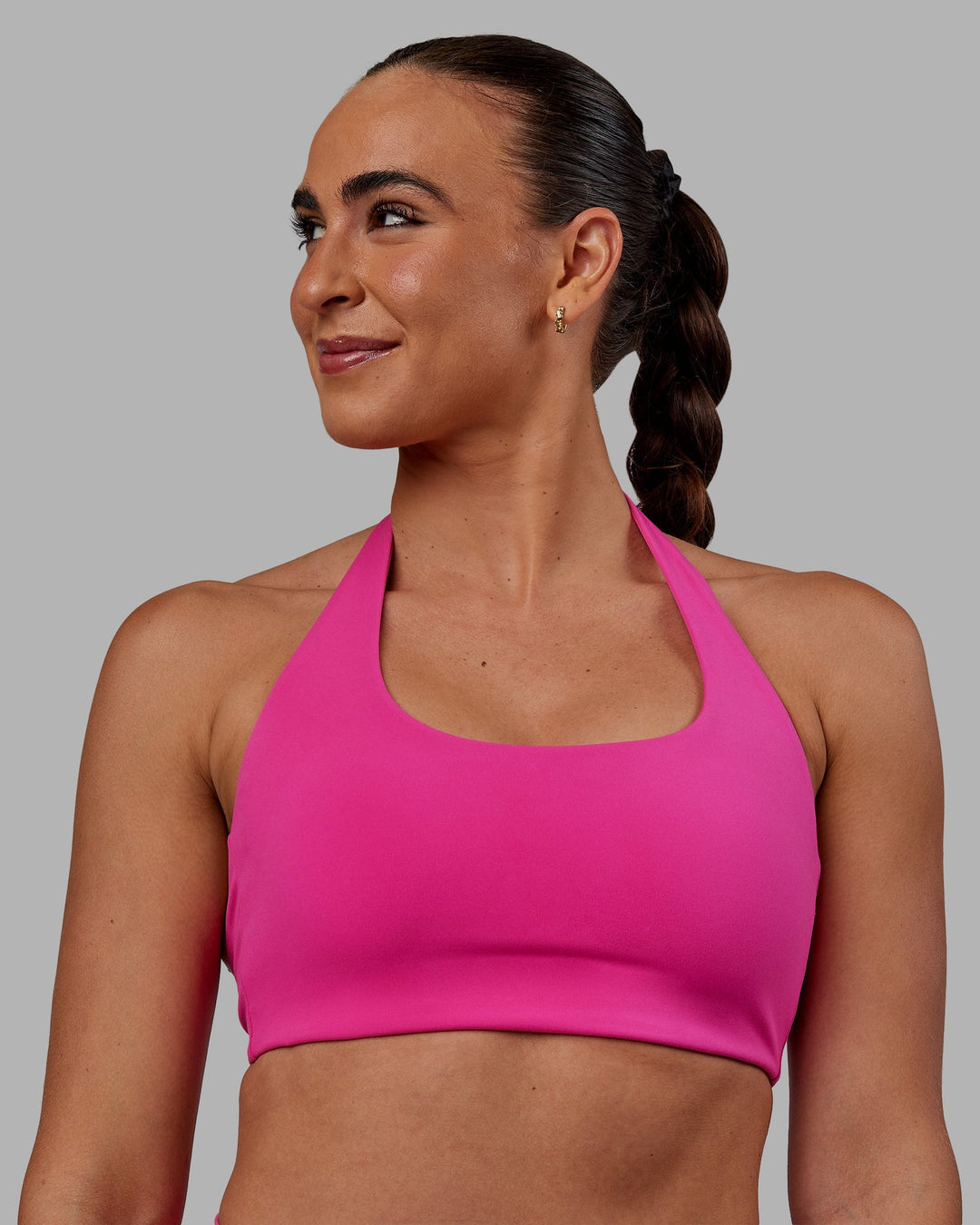 Woman wearing Challenger Sports Bra - Fuchsia Pink