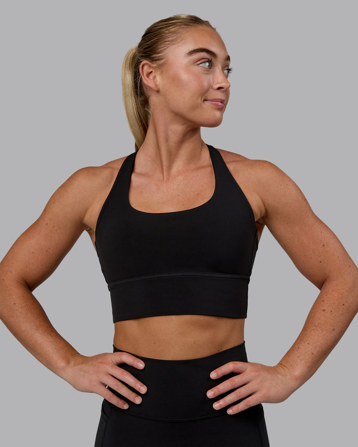 Woman wearing Circuit Sports Bra - Black
