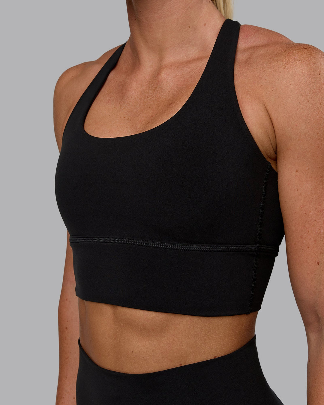 Woman wearing Circuit Sports Bra - Black