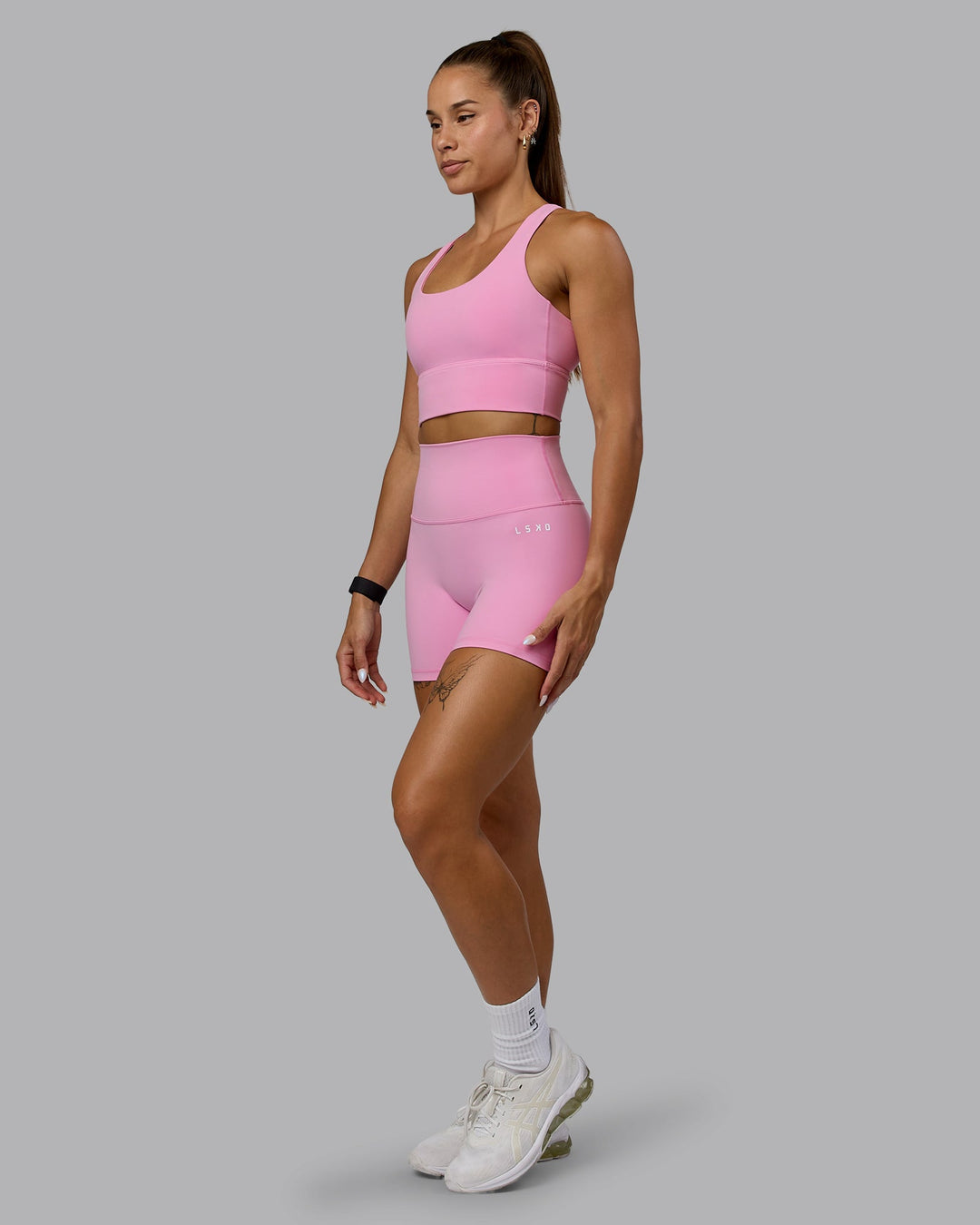 Woman wearing Circuit Sports Bra - Bubblegum