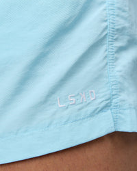 Man wearing Classic 5" Shorts - Crystal Blue