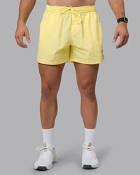 Man wearing Classic 5" Shorts - Lemon