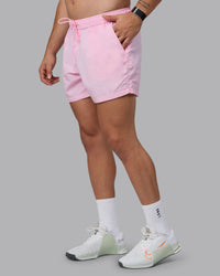 Man wearing Classic 5" Shorts - Pale Pink