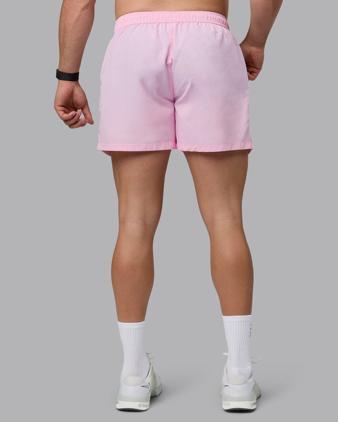 Man wearing Classic 5" Shorts - Pale Pink