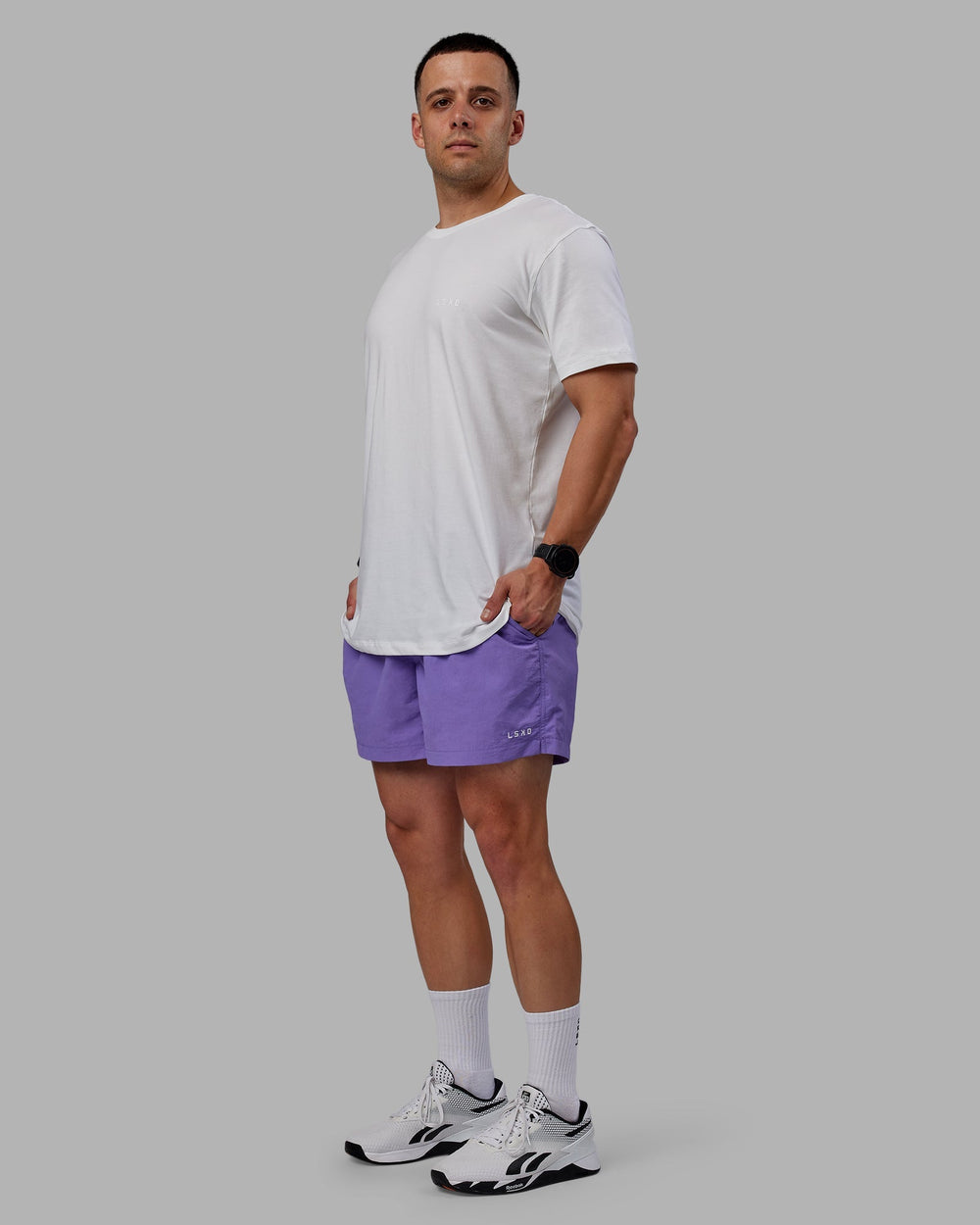 Man wearing Classic 5" Shorts - Dahlia Purple