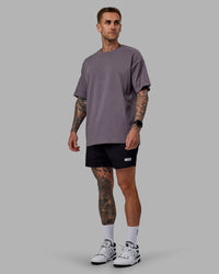 Man wearing Daily 5" Shorts - Black-White | Thumbnail Index: 2