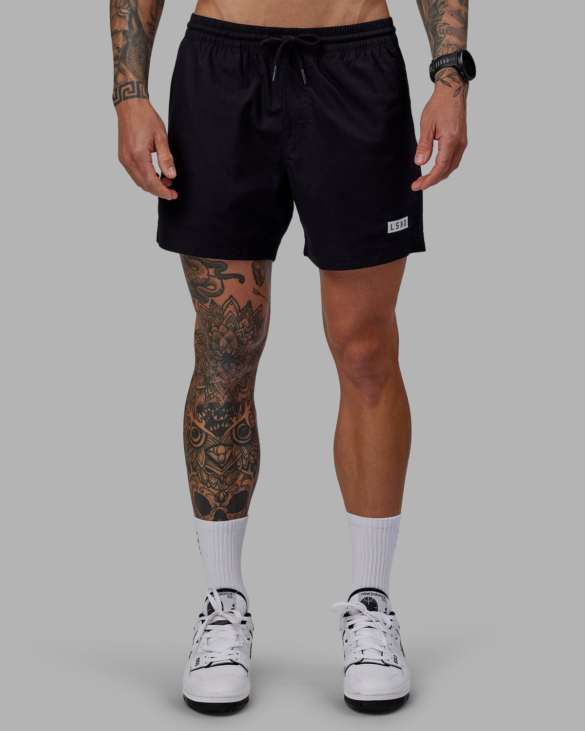 Man wearing Daily 5" Shorts - Black-White - view 2