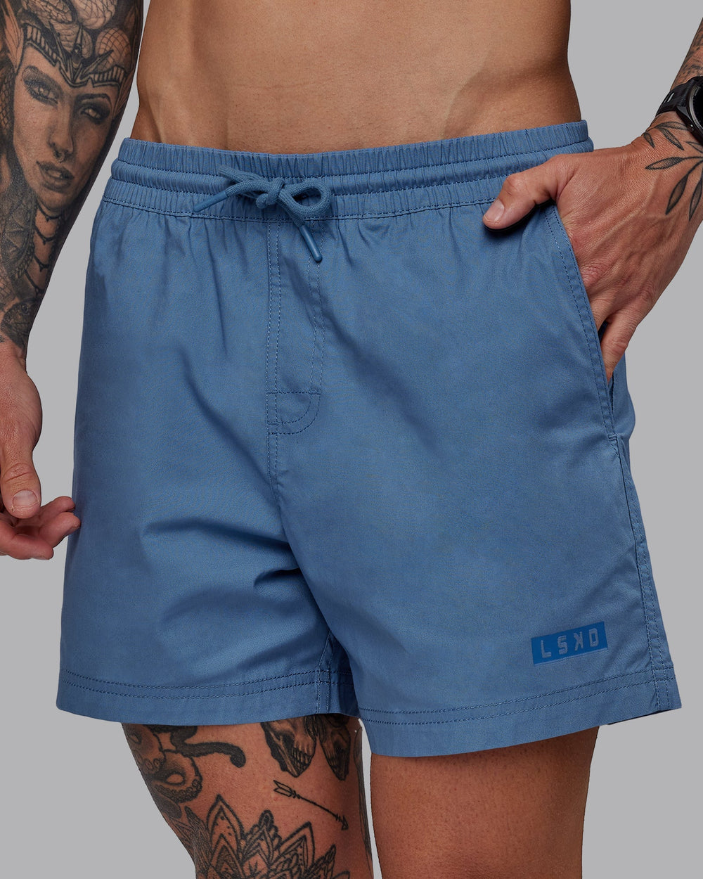 Man wearing Daily 5" Shorts - Elemental Blue