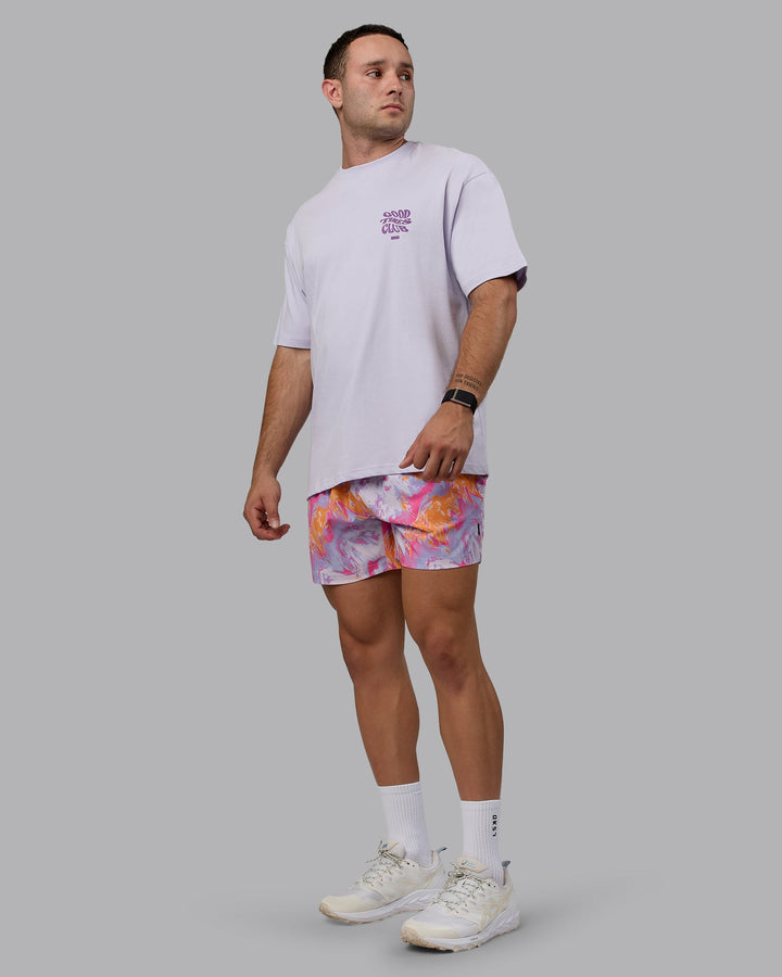 Man wearing Daily 5&quot; Swim Shorts - React Pink-Orange
