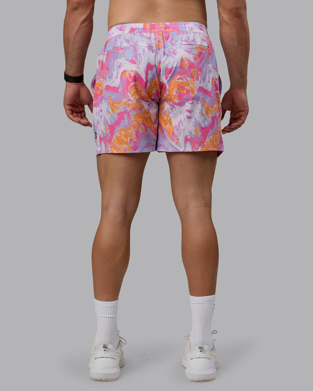 Man wearing Daily 5&quot; Swim Shorts - React Pink-Orange