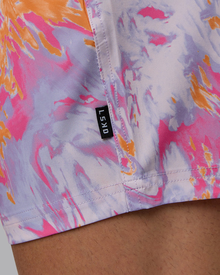 Man wearing Daily 5&quot; Swim Shorts - React Pink-Orange
