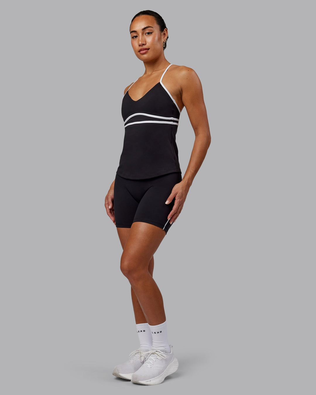 Woman wearing Distinction Performance Tank - Black-White