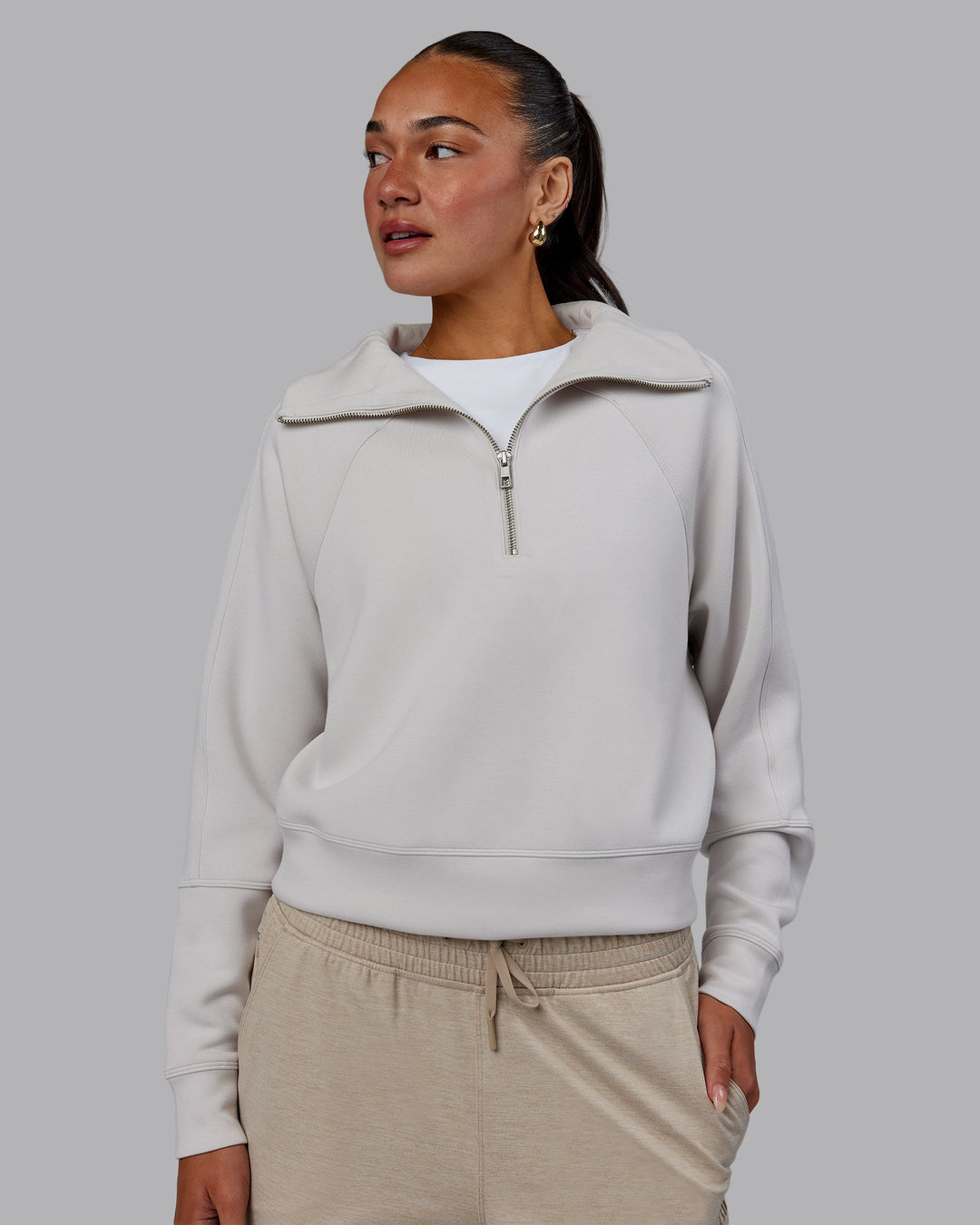 Woman wearing Elevate SoftTouch 1/2 Zip Sweater - Clay-Clay