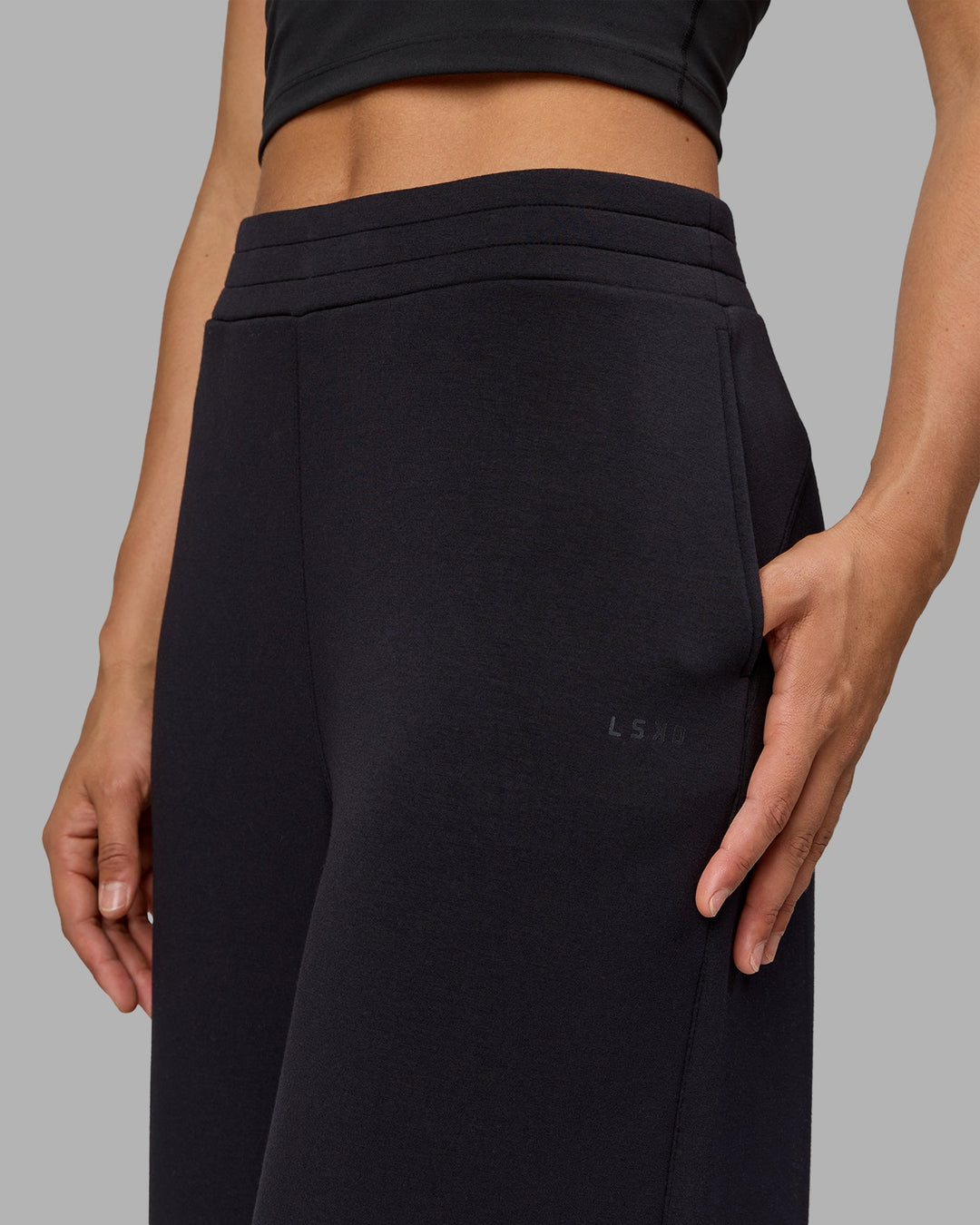 Woman wearing Elevate SoftTouch Wide Leg Pants - Black-Black