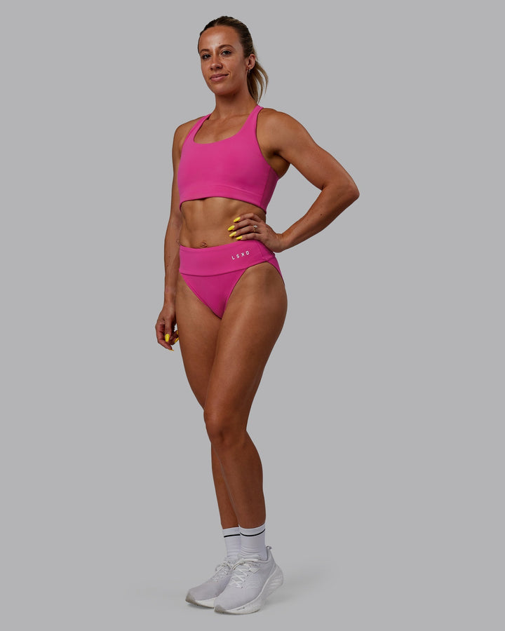 Woman wearing Elevate Sprinting Briefs - Fuchsia Pink
