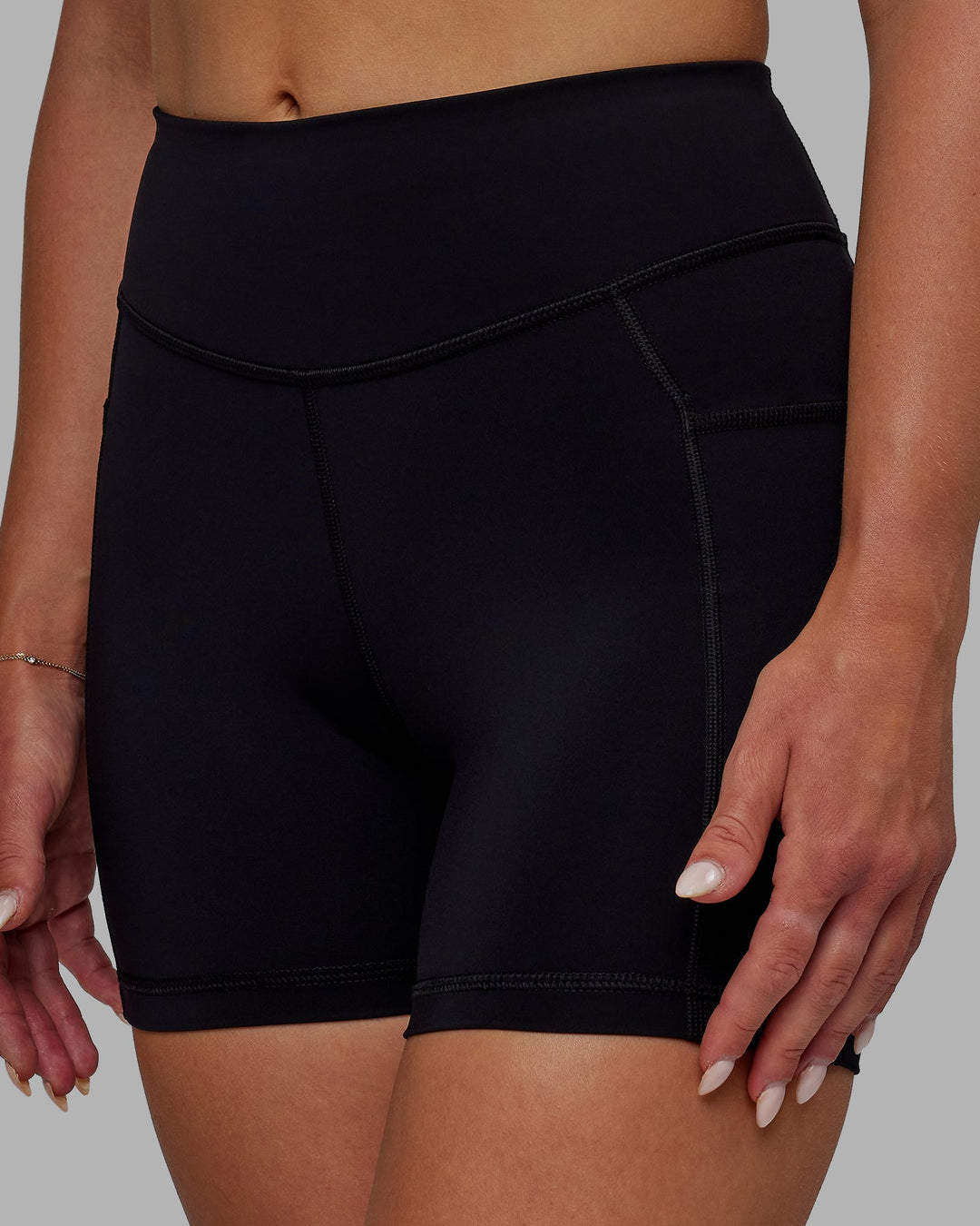 Woman wearing Elite X-Length Shorts - Black