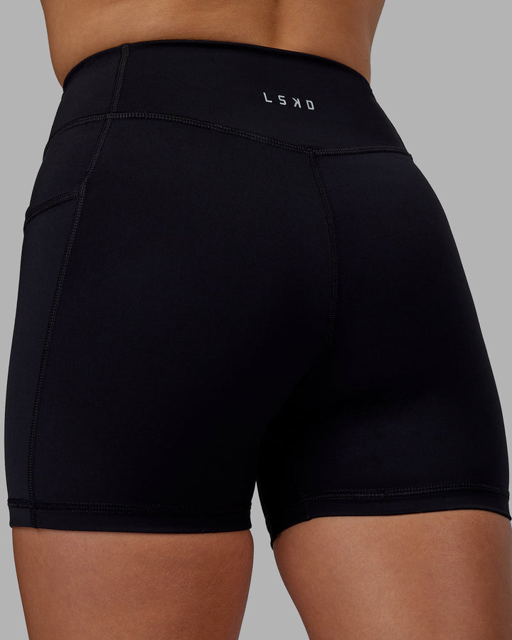 Woman wearing Elite X-Length Shorts - Black
