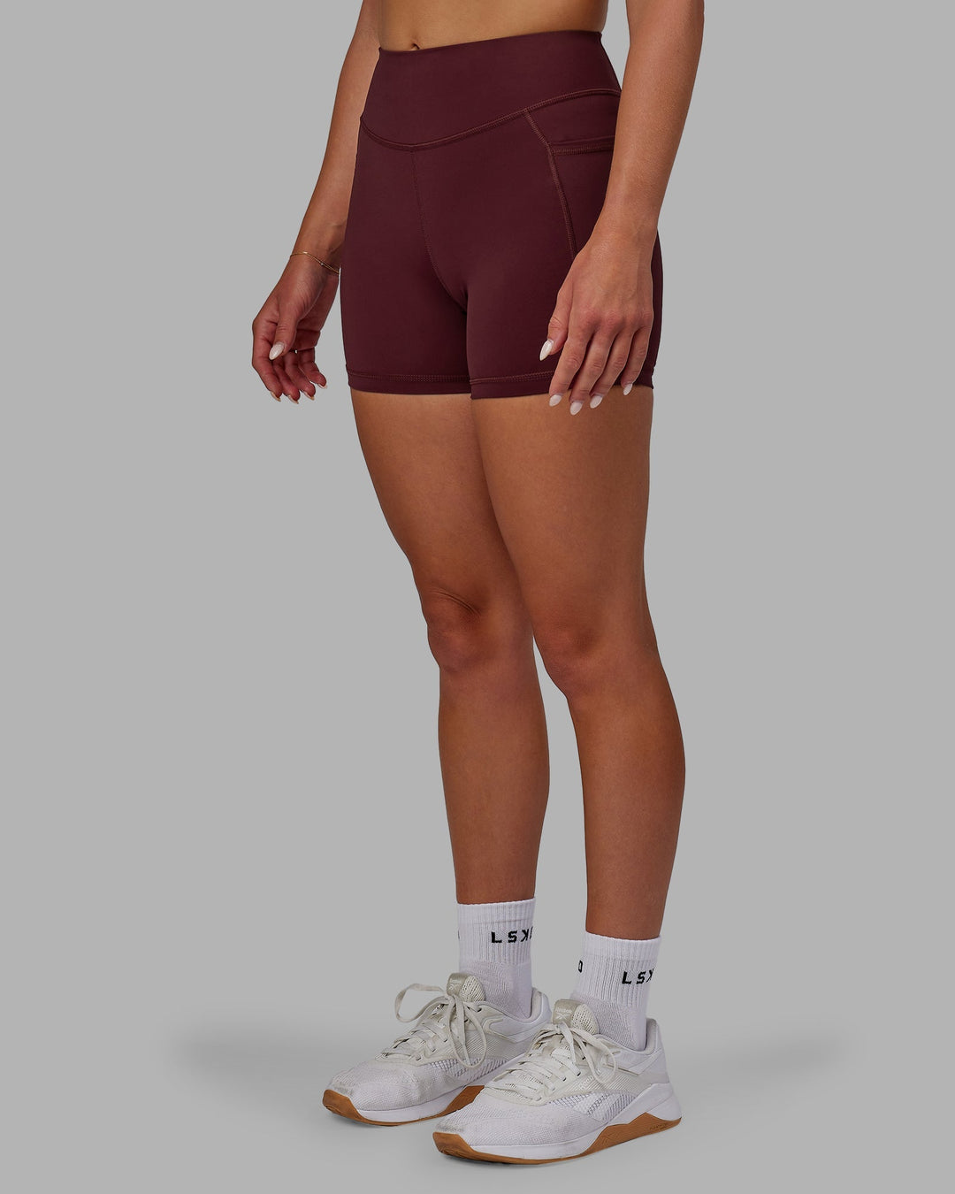 Woman wearing Elite X-Length Shorts - Dark Cherry