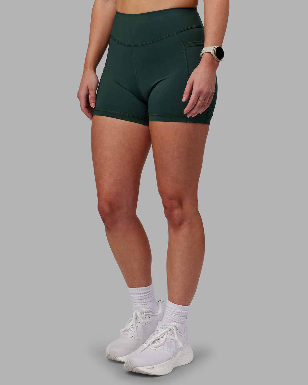 Woman wearing Elite X-Shorts - Vital Green