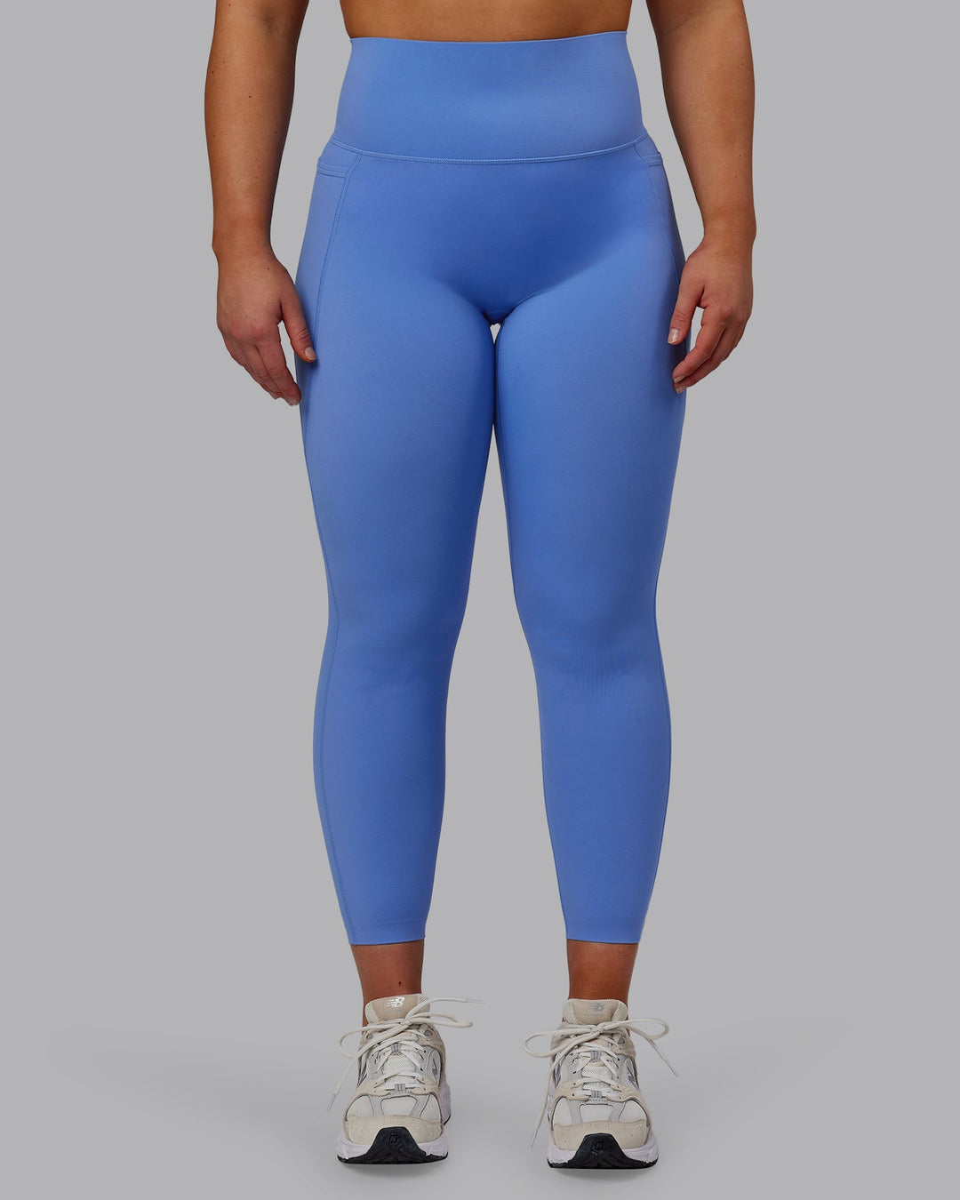 Woman wearing Elixir 7/8 Length Leggings With Pockets - Ultramarine