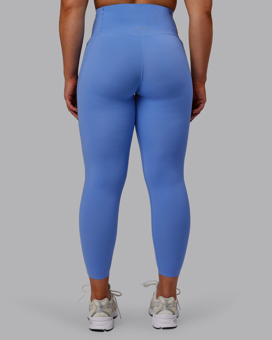 Woman wearing Elixir 7/8 Length Leggings With Pockets - Ultramarine