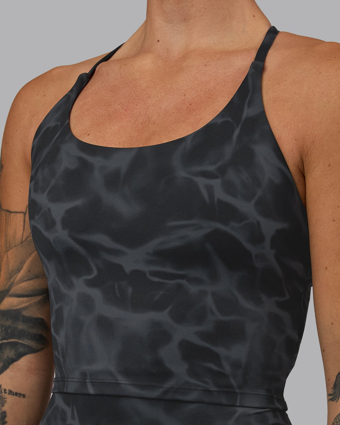 Woman wearing Elixir Active Tank - Tranquil-Black