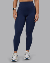 Woman wearing Elixir Ultra High-Rise Full Length Leggings - Future Navy