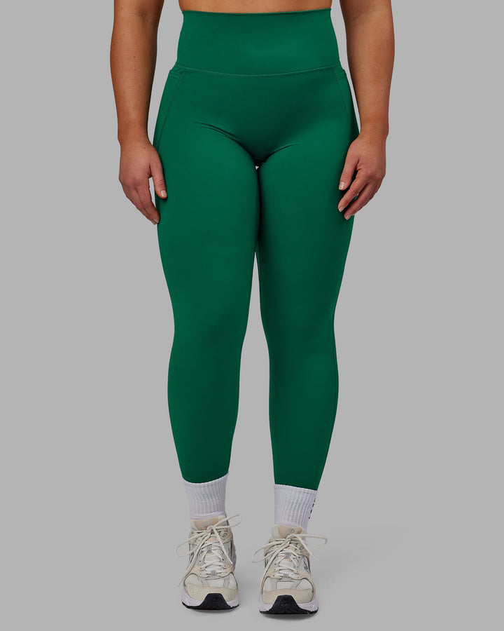 Woman wearing Elixir Full Length Leggings With Pockets - Malachite
