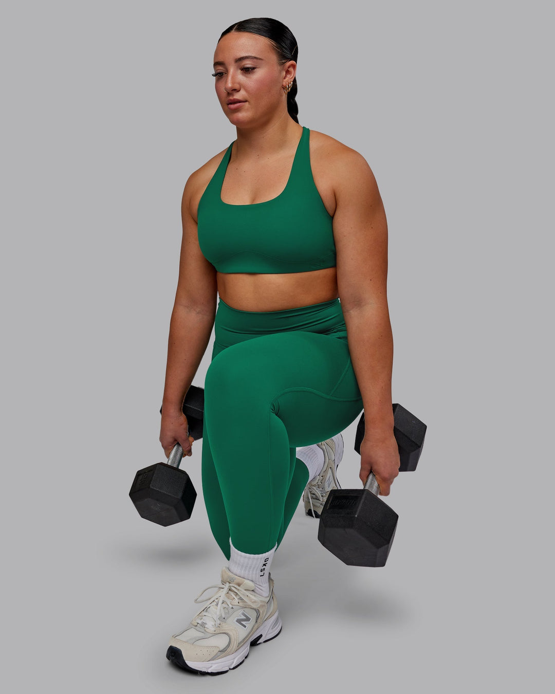 Woman wearing Elixir Full Length Leggings With Pockets - Malachite