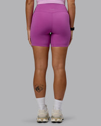 Woman wearing Elixir Ultra High-Rise 6" Short - Orchid