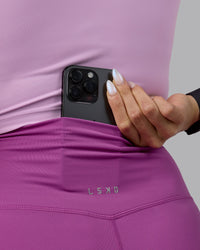 Woman wearing Elixir Ultra High-Rise 6" Short - Orchid