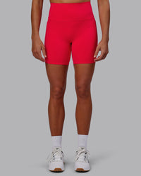 Woman wearing Elixir Ultra High-Rise 6" Short Pockets - Scarlet
