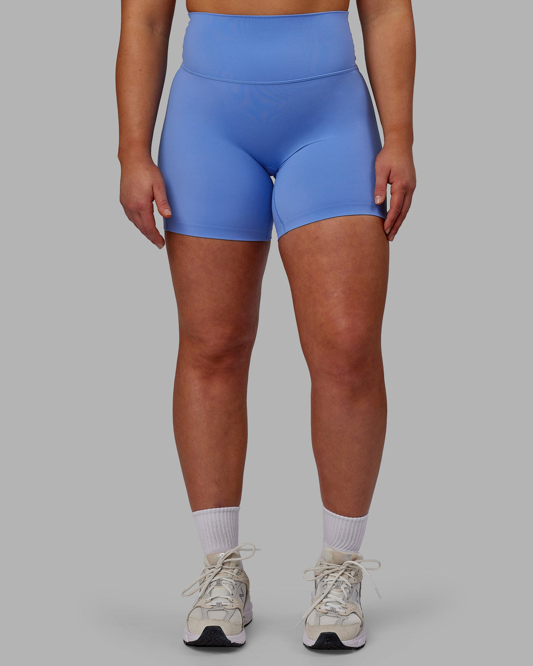 Woman wearing Elixir Mid-Length Shorts - Ultramarine