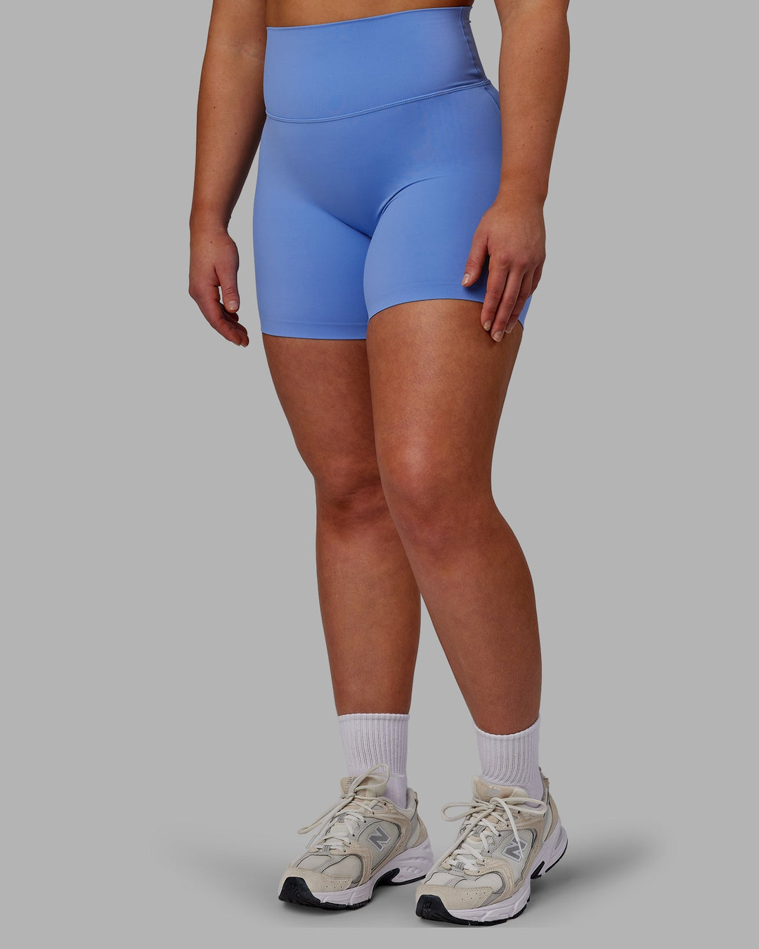 Woman wearing Elixir Mid-Length Shorts - Ultramarine