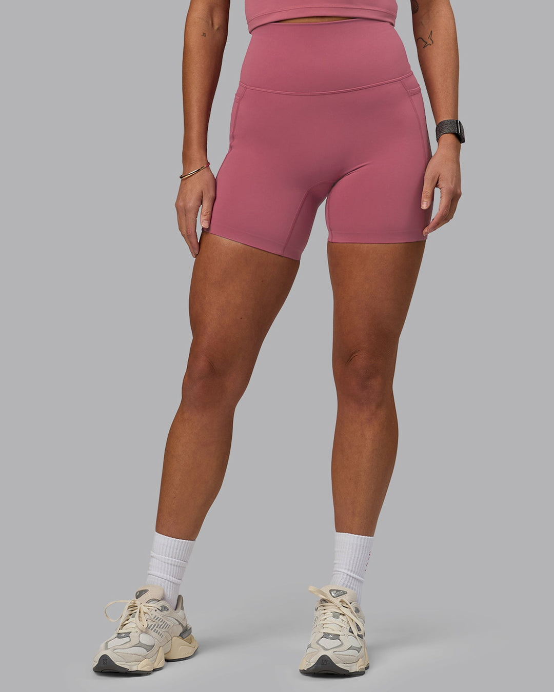 Woman wearing Elixir Mid-Length Shorts With Pockets - Mauve Haze