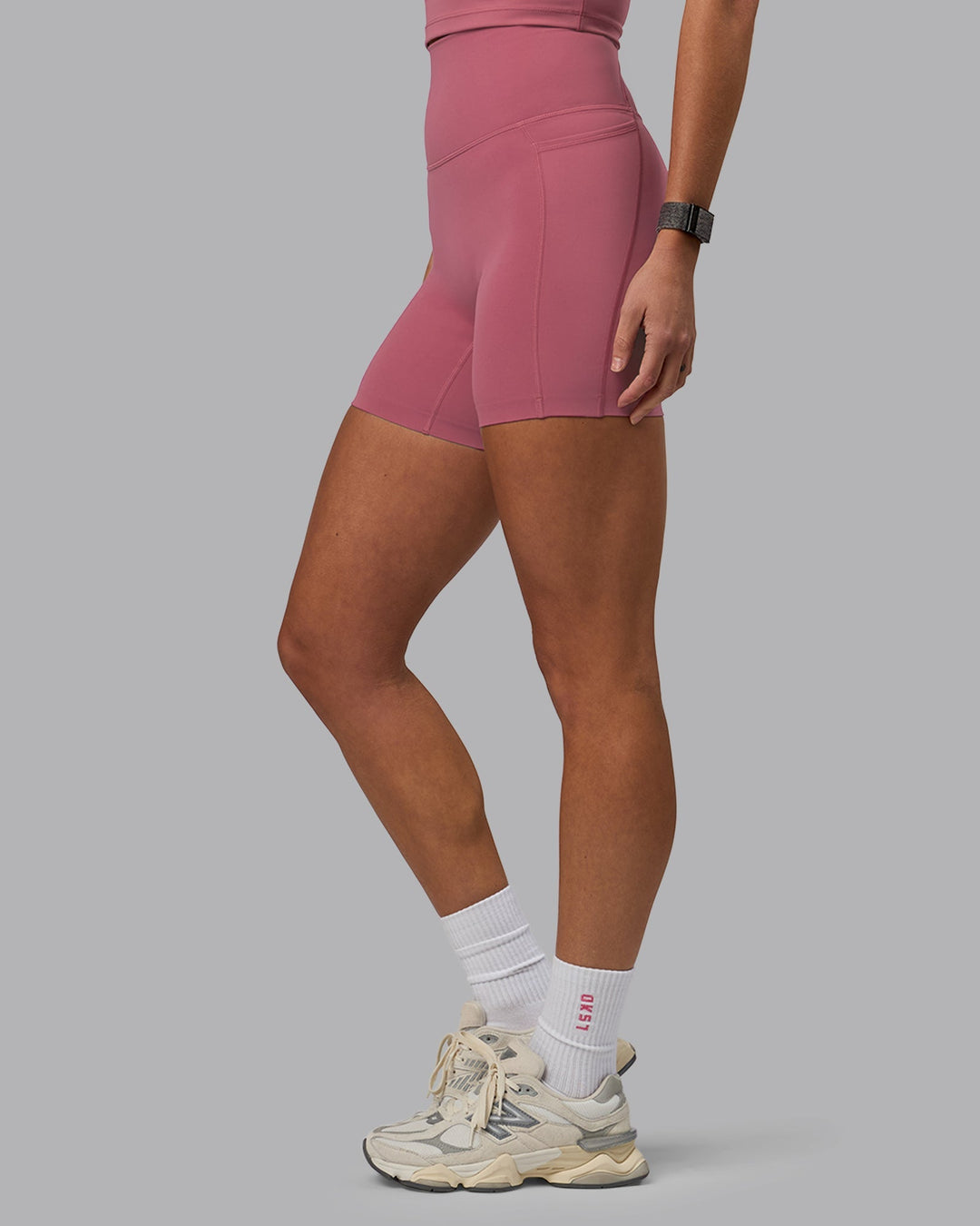 Woman wearing Elixir Mid-Length Shorts With Pockets - Mauve Haze