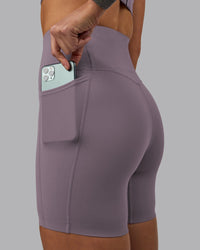 Woman wearing Elixir Ultra High-Rise 6" Short Pockets - Purple Sage