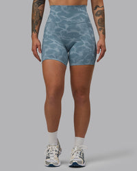 Woman wearing Elixir Ultra High-Rise 6" Short Pockets - Tranquil-Elemental Blue