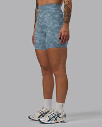 Woman wearing Elixir Ultra High-Rise 6" Short Pockets - Tranquil-Elemental Blue
