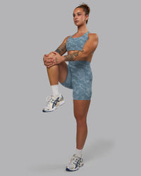 Woman wearing Elixir Ultra High-Rise 6" Short Pockets - Tranquil-Elemental Blue