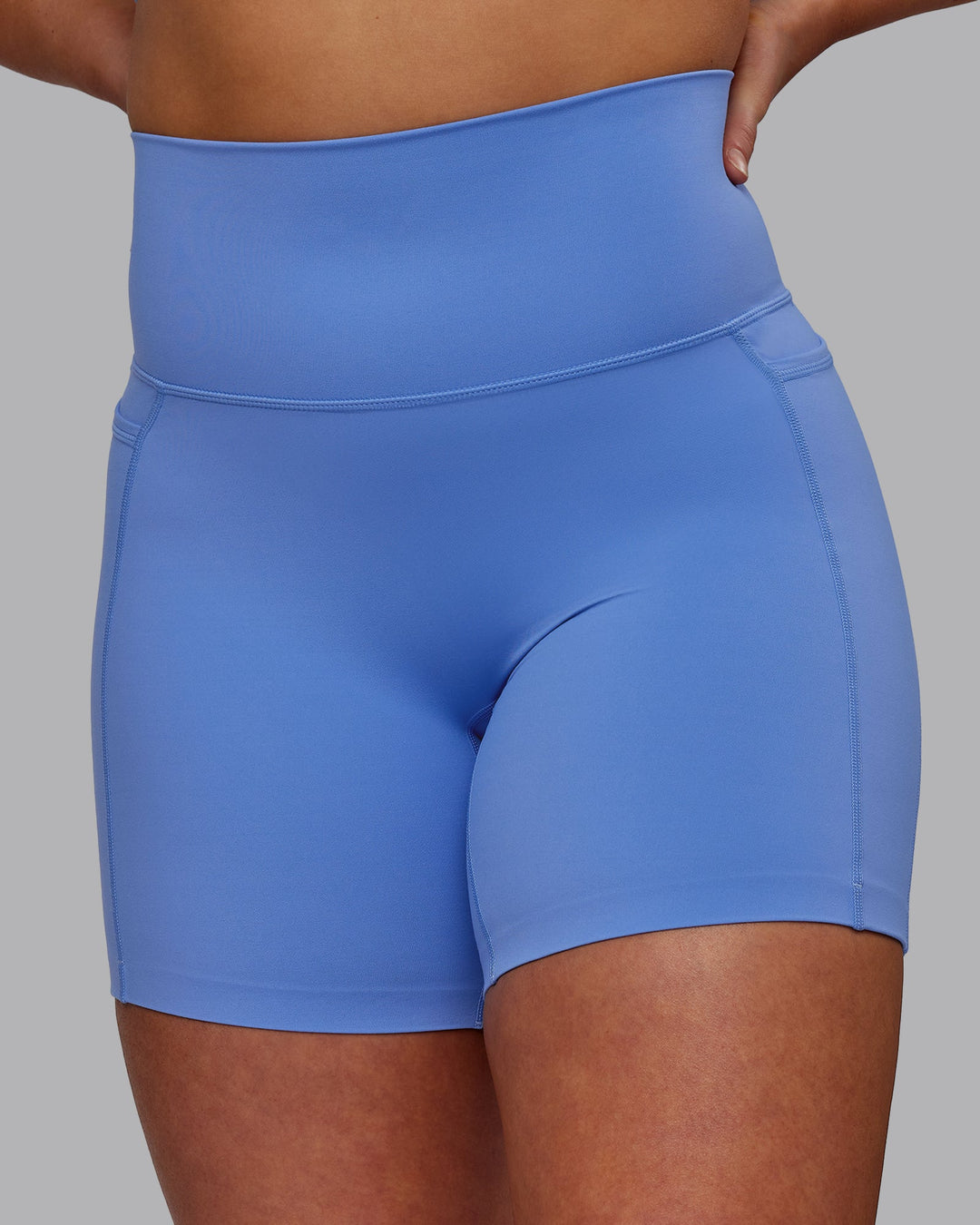 Woman wearing Elixir Mid-Length Shorts with Pockets - Ultramarine